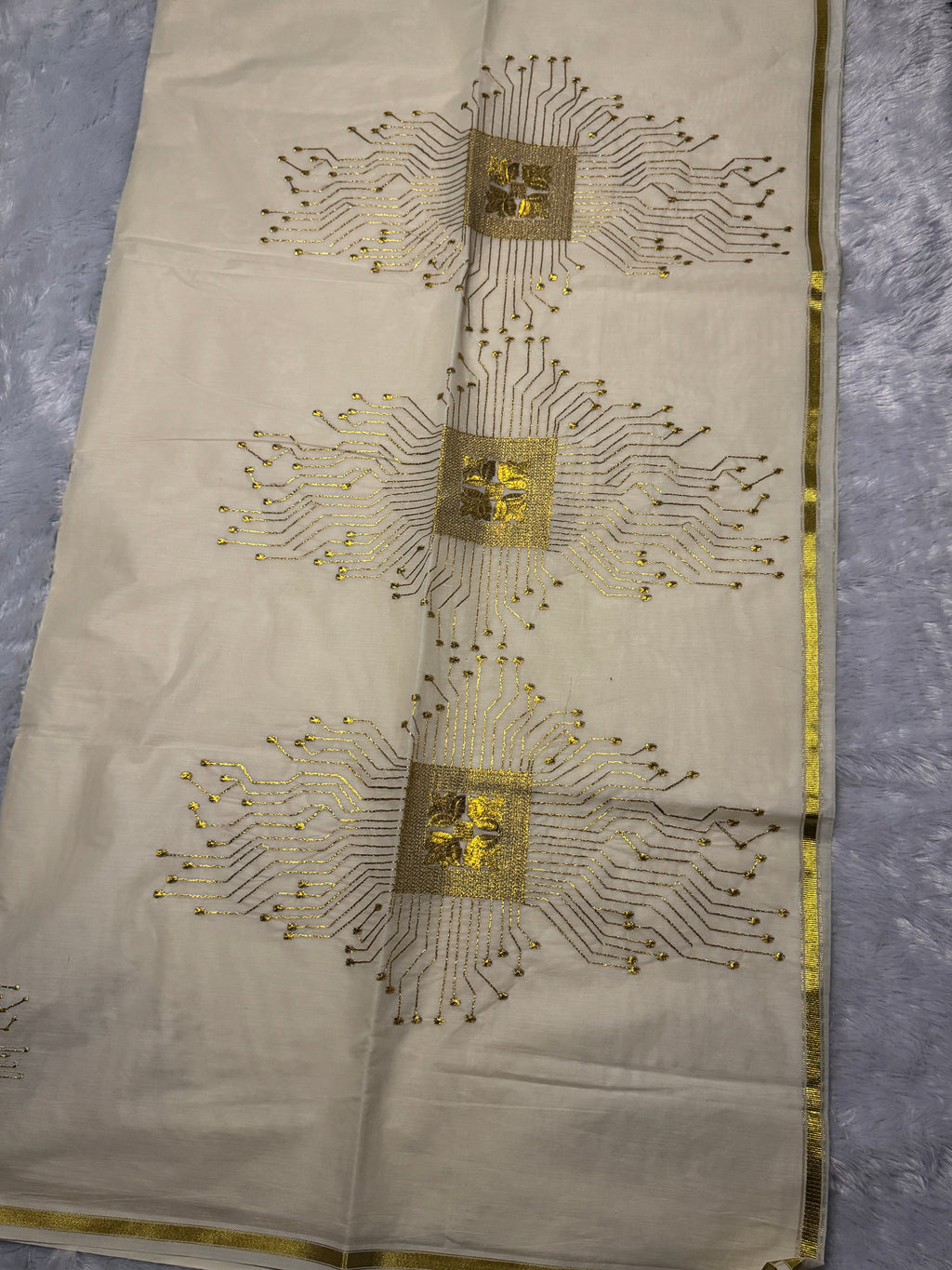 Ivory Cream Kerala Cotton Saree with Futuristic Golden Zari Matrix Motifs