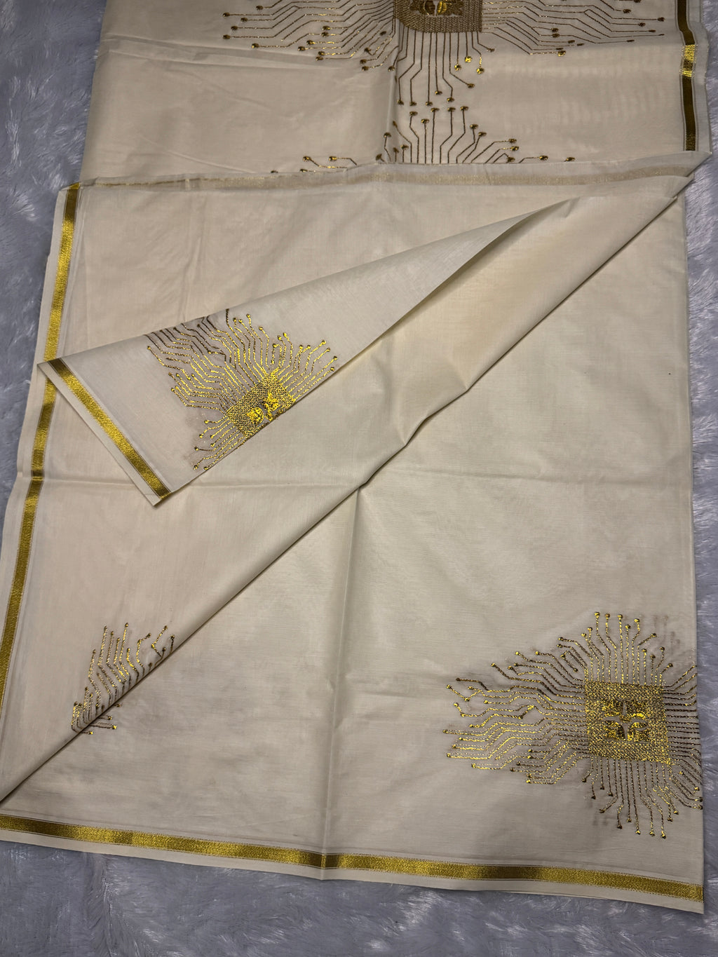 Ivory Cream Kerala Cotton Saree with Futuristic Golden Zari Matrix Motifs
