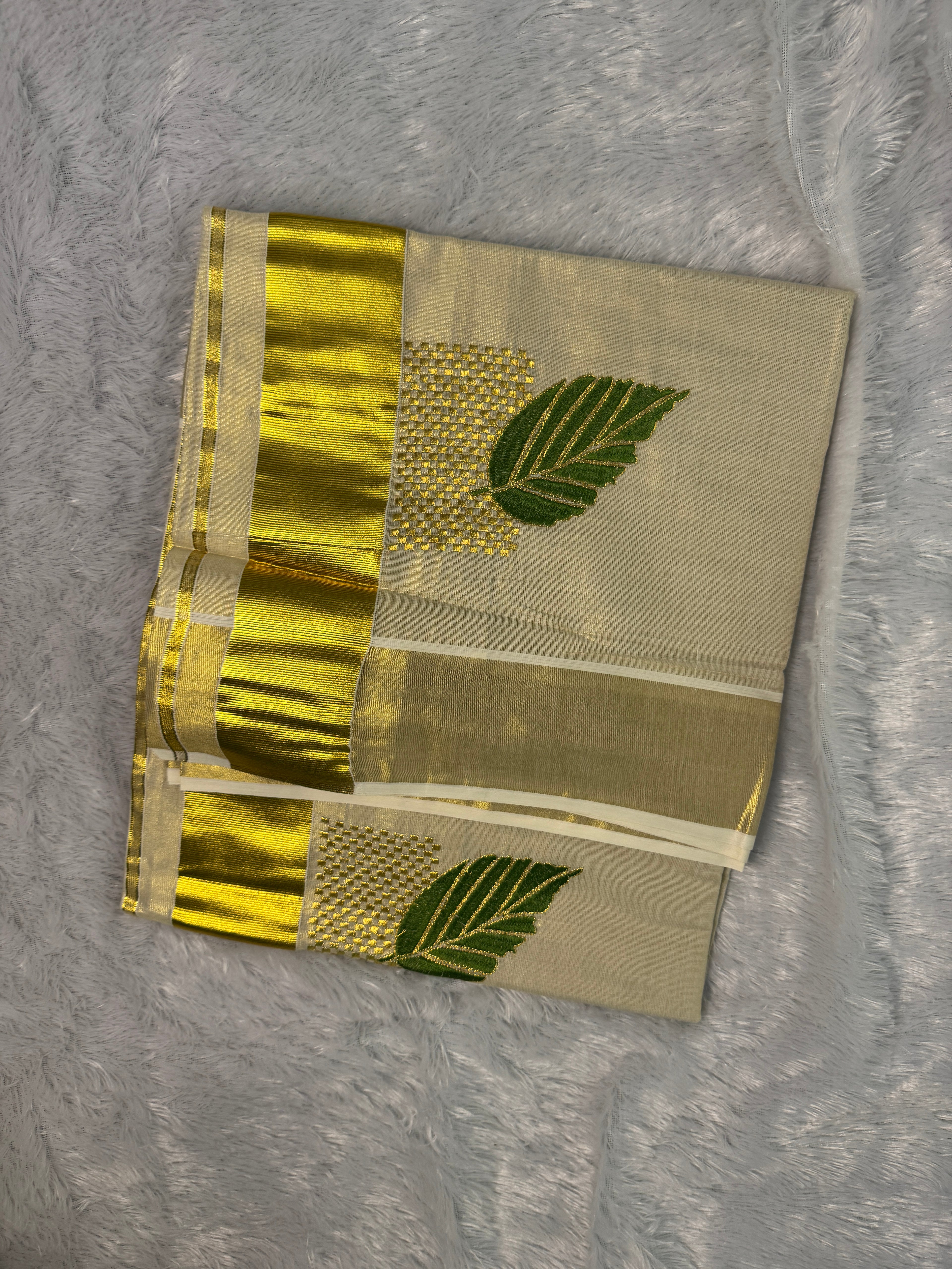 Gilded Shimmer Tissue Kerala Saree with Contemporary Leaf & Zari Grid Embroidery