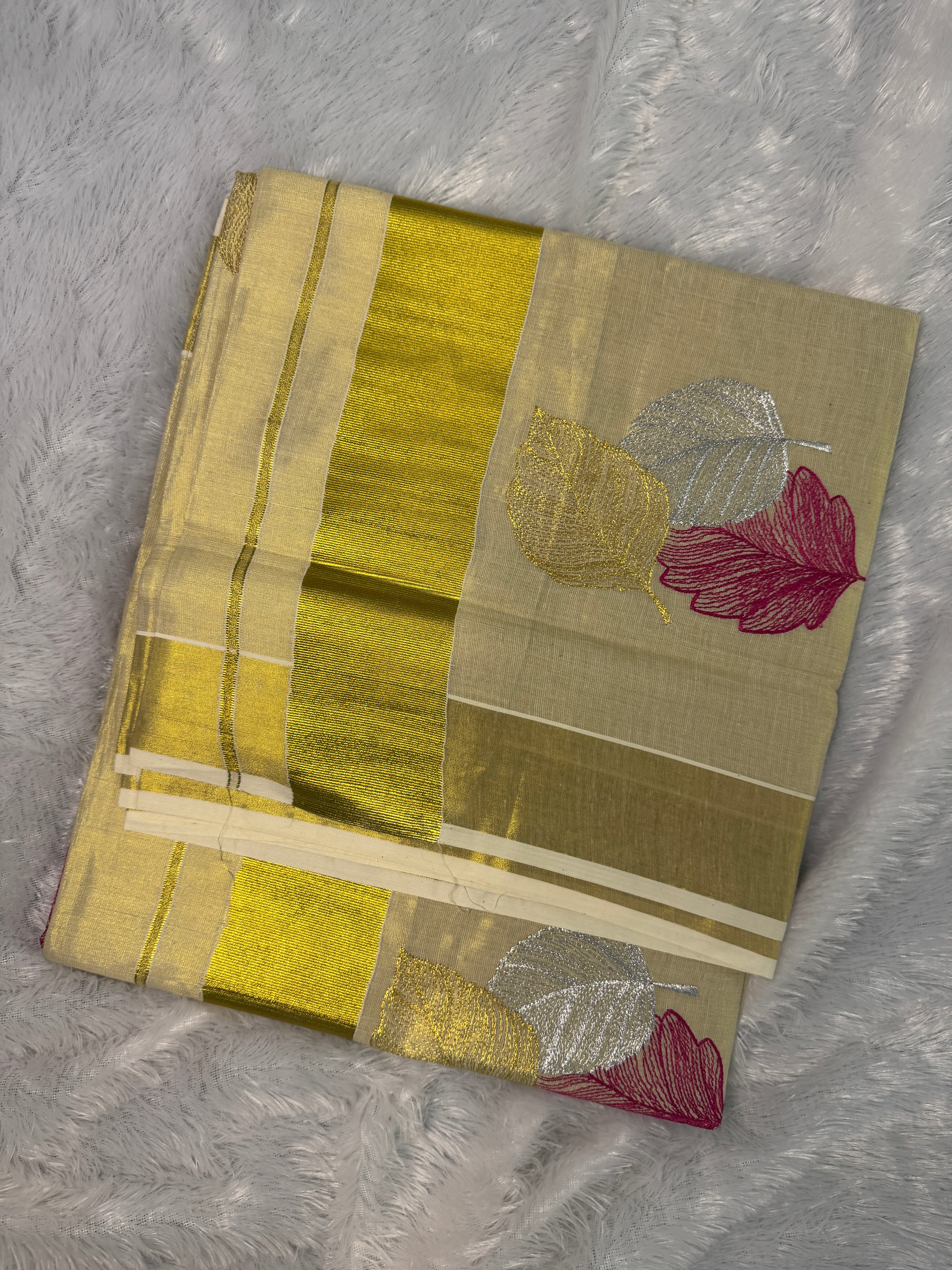 Gilded Shimmer Tissue Kerala Saree with Metallic Tri-Leaf Embroidery