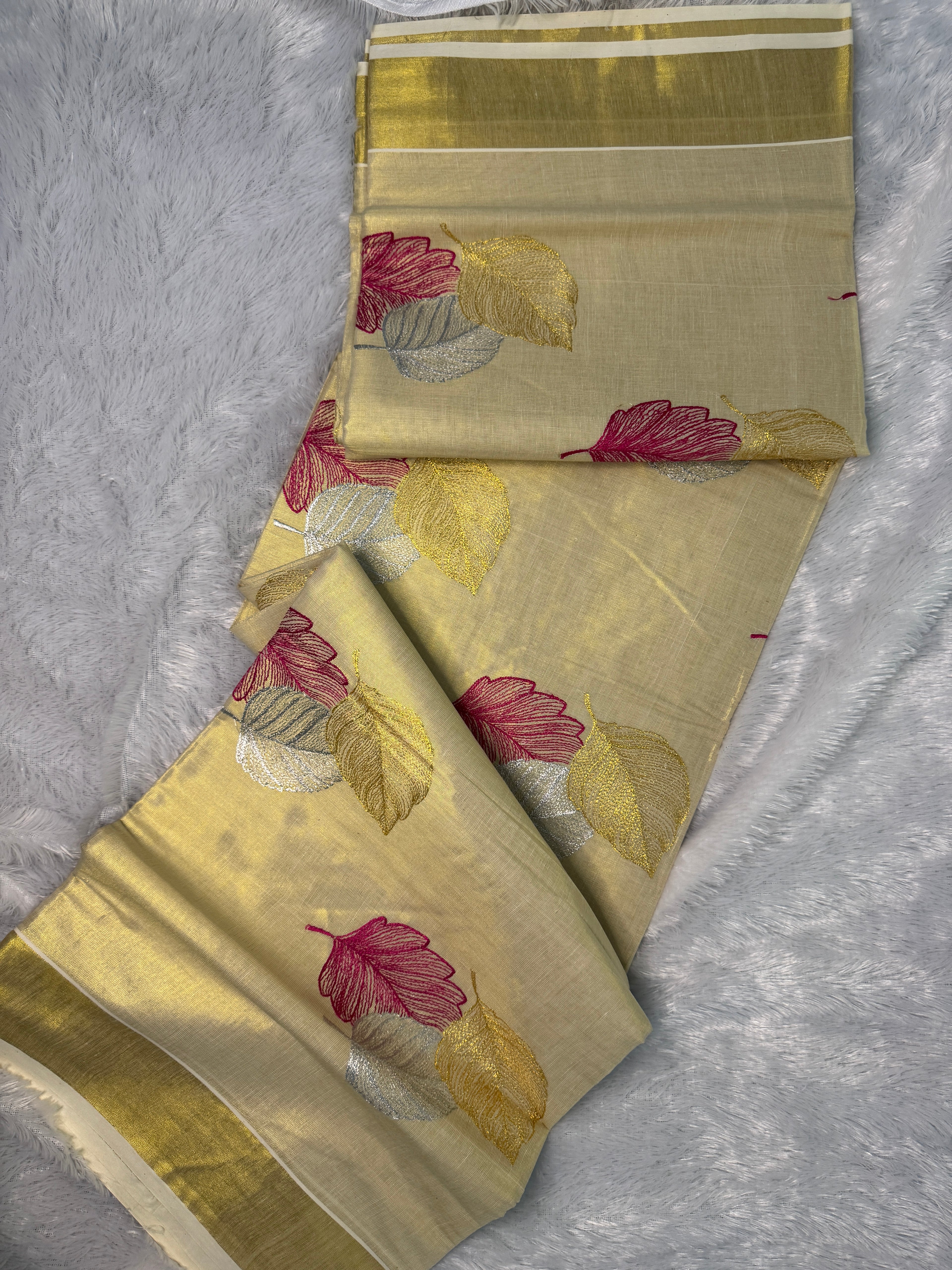 Gilded Shimmer Tissue Kerala Saree with Metallic Tri-Leaf Embroidery