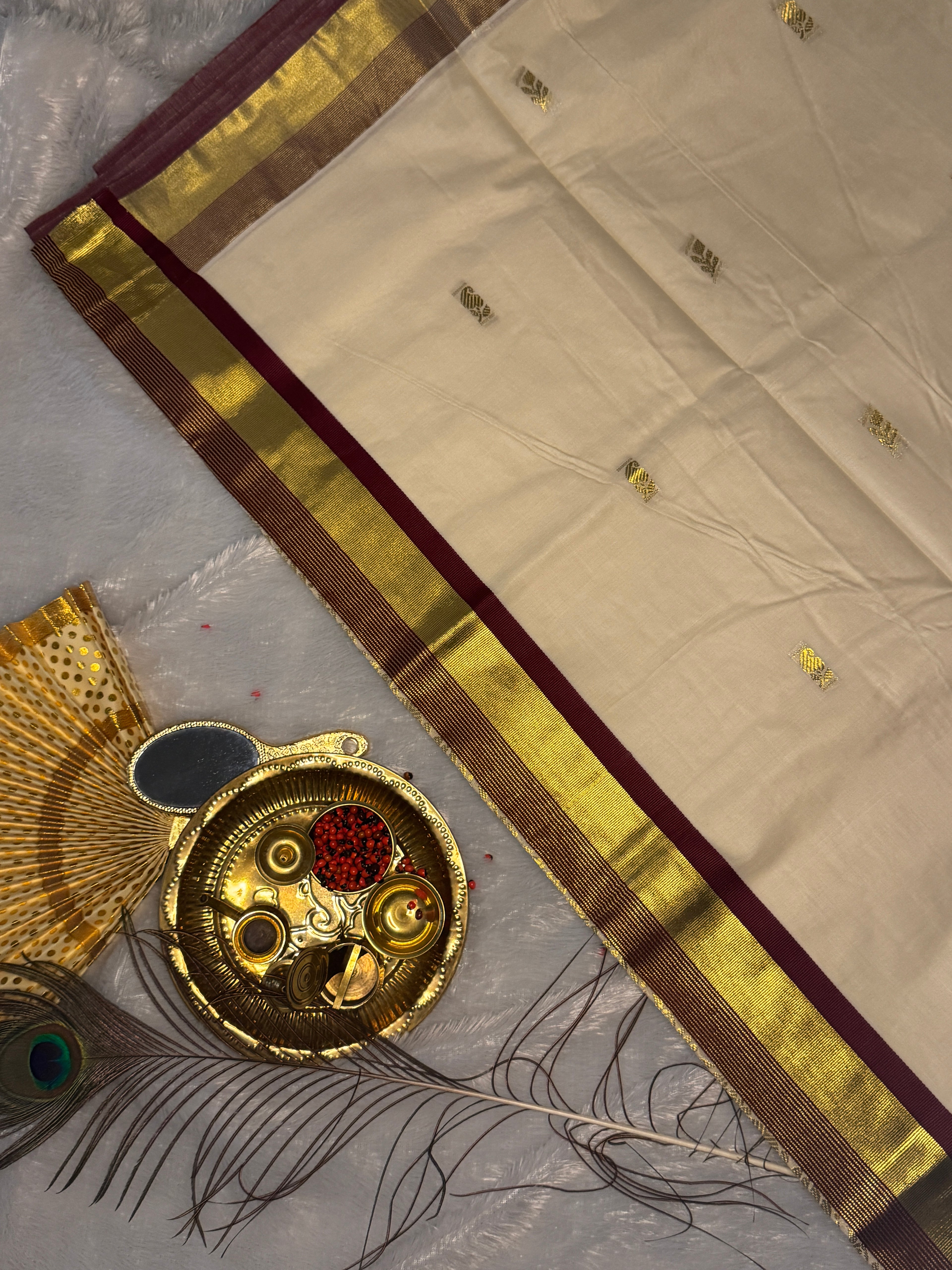 Ivory Cotton Kerala Saree with Heavily Woven Gold Peacock Medallions & Contrast Piping