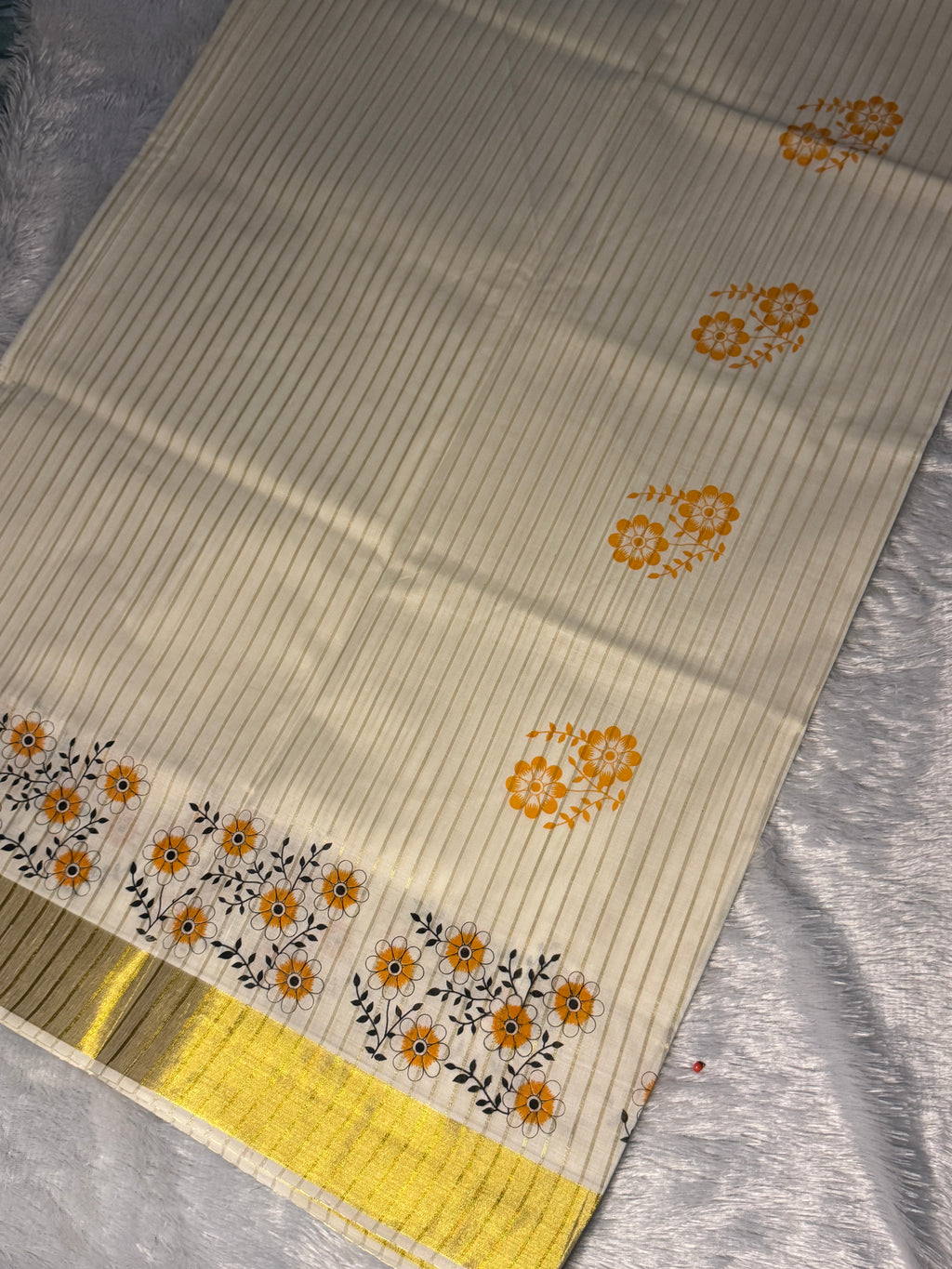 Kerala Kasavu with Floral Elegance