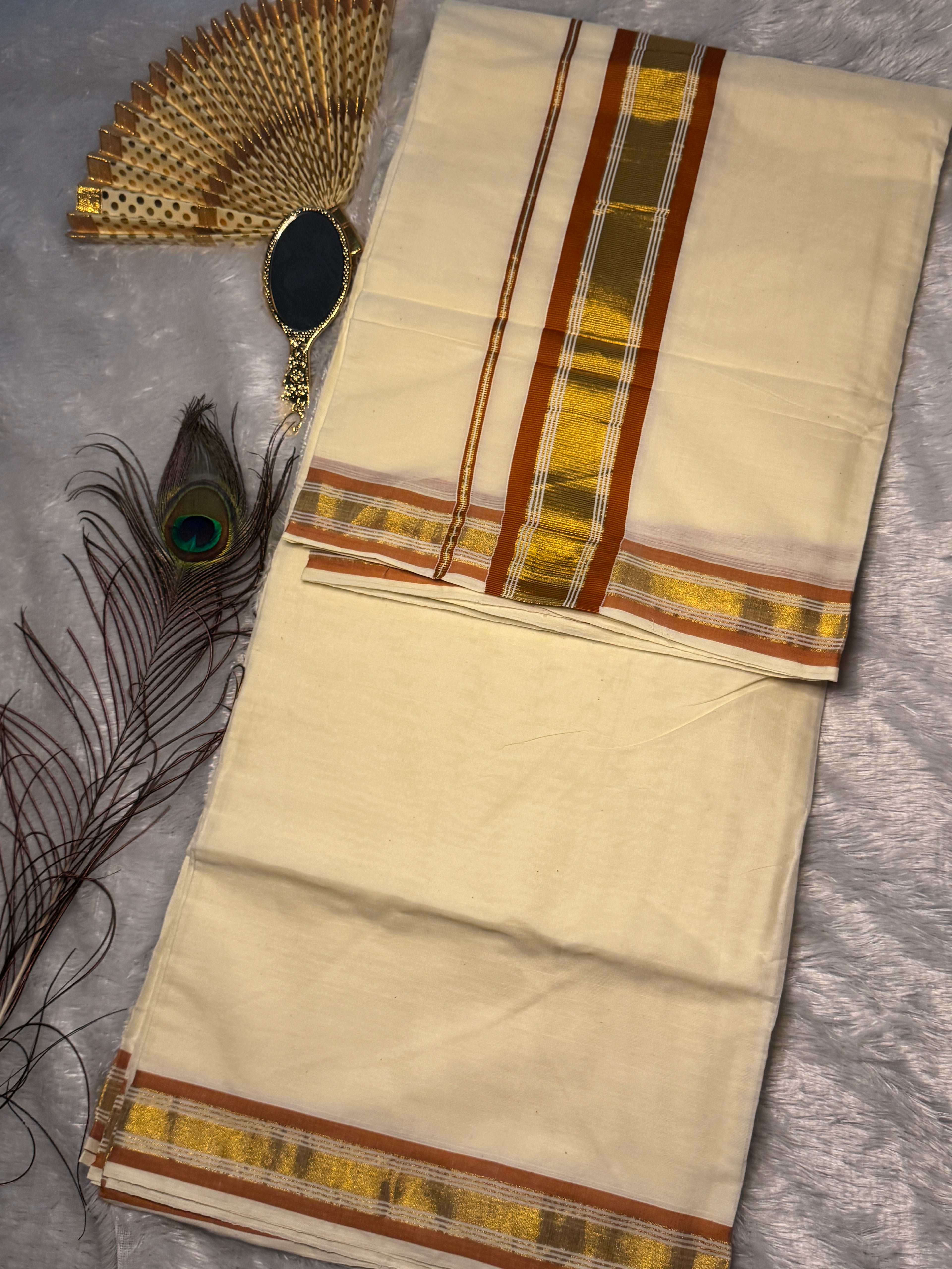 Premium Cotton Kerala Kasavu Saree with Warm Copper/ Midnight Blue & Gold Border