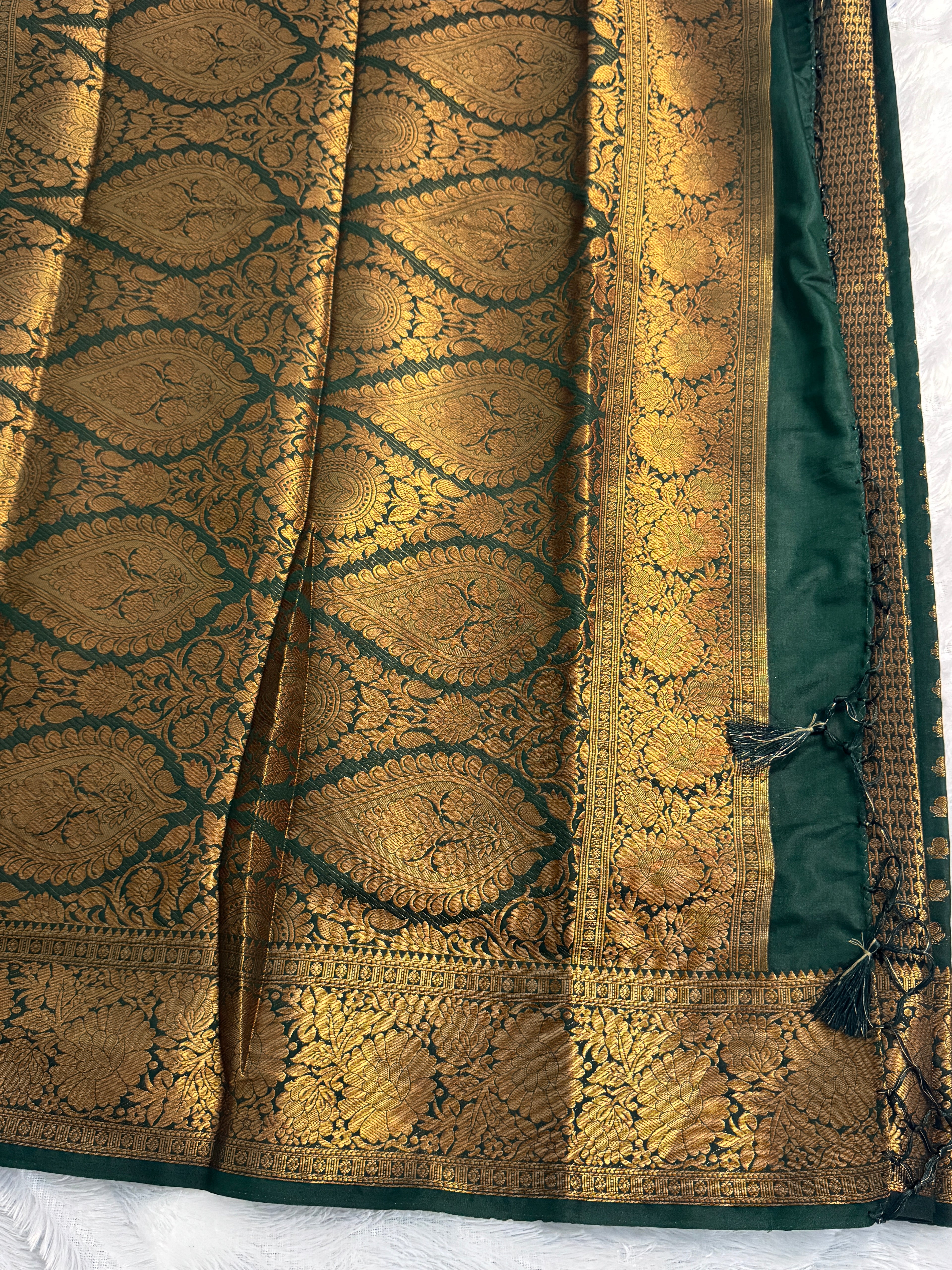 Rich Emerald Green Semi Banarasi Silk Saree with Heavy Gold Pallu & Tassels